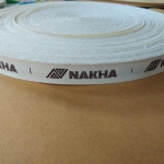 ป้ายคอเสื้อ เทปละเอียด 1.5 ซม.พิมพ์น้ำตาล 1 ม้วน