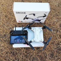 DRONE S6 SMART โดรนติดกล้อง 1080 P FPV WIFI 2.4GHZ มีระบบล็อคความสูงและบินกลับอัตโนมัติ บินง่ายชุดพร้อมเล่น
