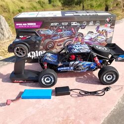 รถบังคับวิทยุ: Wltoys Item No:124018 มาตราส่วน: 1/12 ความเร็วสูงสุด: 60 กม. / ชม ระบบพลังงาน ESC: แผงวงจรรวม Motor:550 brushed motor