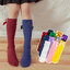 ถุงเท้ายาวเด็กผู้หญิงสีแดง(ไวน์) สีขาว สีเขียวเข้ม สีชมพู สีดำ สีม่วงเข้ม สีเหลือง ติดโบว์น่ารัก สดใส สไตล์แฟชั่นเกาหลี ขนาดแบบฟรีไซส์ ยาว 28 cm.