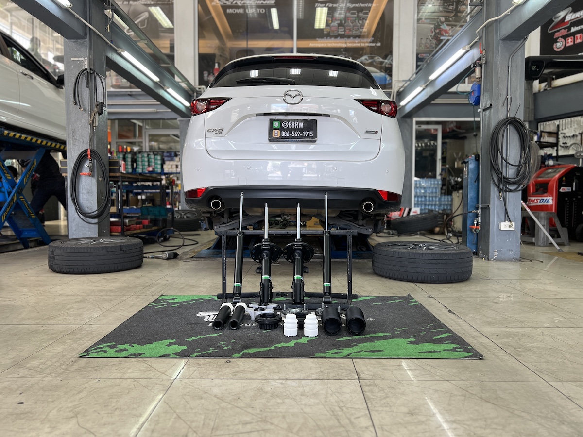 Mazda CX-5 KF | โช้คอัพ Tein EnduraPro Basic | คืนความหนึบแน่นสไตล์สปอร์ต - ยางเจริญรุ่งเรือง นนทบุรี Mazda CX-5 (KF) คันนี้...อัปเกรดความหนึบ คืนฟีลลิ่งสปอร์ต! ใครใช้ Mazda CX-5 (KF) แล้วรู้สึกว่าช่วงล่างเริ่มยวบยาบ โยนตัวมาก หรือไม่มั่นใจเมื่อเข้าโค้ง... ถึงเวลาเปลี่ยนโช้คอัพใหม่ เพื่อการขับขี่ที่มั่นใจและสบายกว่าที่เคย! เราขอแนะนำชุดอัปเกรดโช้คอัพที่ครบจบในชุดเดียว! ติดตั้งโช้คอัพ Tein EnduraPro Basic พร้อมอะไหล่ส่วนควบใหม่ครบชุด สิ่งที่จะได้รับหลังจากติดตั้ง: ฟีลลิ่งหนึบแน่นสไตล์ญี่ปุ่น: โช้คอัพ Tein EnduraPro Basic ให้ความหนึบแน่นที่เหนือกว่าโช้คเดิม แต่ยังคงความนุ่มนวลไว้ เทคโนโลยี H.B.S.: ช่วยดูดซับแรงกระแทกในจังหวะยุบตัวสุด ลดอาการกระดอนเมื่อเจอหลุมหรือคอสะพาน คุณภาพมาตรฐาน OEM: ผลิตจากวัสดุคุณภาพสูง ทนทาน และติดตั้งแทนของเดิมได้ทันที ไม่ต้องดัดแปลง ความมั่นคงที่เพิ่มขึ้น: รถทรงตัวได้นิ่งขึ้น เข้าโค้งมั่นใจ ลดอาการโคลงเคลงของรถ SUV เหมาะสำหรับใคร? เจ้าของ CX-5 KF ที่ต้องการความหนึบและมั่นคงในการขับขี่ประจำวัน ผู้ที่ต้องการอัปเกรดความทนทานและความปลอดภัยของช่วงล่าง โดยไม่ต้องการโหลดเตี้ย สำหรับเจ้าของ CX-5 ที่อยากได้ฟีลลิ่งขับขี่ที่มั่นใจกว่าเดิม Tein EnduraPro Basic คือคำตอบ! สอบถามข้อมูลเพิ่มเติม หรือนัดหมายเข้ารับบริการ ️ : 08-6569-1915 ️ : 08-6544-5963 Line id : @88rw Location : https://goo.gl/maps/HrNUAZXPN94KvxZ98 Facebook : https://www.facebook.com/88rwtire #Mazda #CX5 #CX5KF #Tein #EnduraPro #โช้คอัพ #ช่วงล่าง #ยางเจริญรุ่งเรือง #นนทบุรี #งามวงศ์วาน #ตั้งศูนย์ #อะไหล่ช่วงล่าง Mazda CX-5 KF | โช้คอัพ Tein EnduraPro Basic | คืนความหนึบแน่นสไตล์สปอร์ต - ยางเจริญรุ่งเรือง นนทบุรี Mazda CX-5 (KF) คันนี้...อัปเกรดความหนึบ คืนฟีลลิ่งสปอร์ต! ใครใช้ Mazda CX-5 (KF) แล้วรู้สึกว่าช่วงล่างเริ่มยวบยาบ โยนตัวมาก หรือไม่มั่นใจเมื่อเข้าโค้ง... ถึงเวลาเปลี่ยนโช้คอัพใหม่ เพื่อการขับขี่ที่มั่นใจและสบายกว่าที่เคย! เราขอแนะนำชุดอัปเกรดโช้คอัพที่ครบจบในชุดเดียว! ติดตั้งโช้คอัพ Tein EnduraPro Basic พร้อมอะไหล่ส่วนควบใหม่ครบชุด สิ่งที่จะได้รับหลังจากติดตั้ง: ฟีลลิ่งหนึบแน่นสไตล์ญี่ปุ่น: โช้คอัพ Tein EnduraPro Basic ให้ความหนึบแน่นที่เหนือกว่าโช้คเดิม แต่ยังคงความนุ่มนวลไว้ เทคโนโลยี H.B.S.: ช่วยดูดซับแรงกระแทกในจังหวะยุบตัวสุด ลดอาการกระดอนเมื่อเจอหลุมหรือคอสะพาน คุณภาพมาตรฐาน OEM: ผลิตจากวัสดุคุณภาพสูง ทนทาน และติดตั้งแทนของเดิมได้ทันที ไม่ต้องดัดแปลง ความมั่นคงที่เพิ่มขึ้น: รถทรงตัวได้นิ่งขึ้น เข้าโค้งมั่นใจ ลดอาการโคลงเคลงของรถ SUV เหมาะสำหรับใคร? เจ้าของ CX-5 KF ที่ต้องการความหนึบและมั่นคงในการขับขี่ประจำวัน ผู้ที่ต้องการอัปเกรดความทนทานและความปลอดภัยของช่วงล่าง โดยไม่ต้องการโหลดเตี้ย สำหรับเจ้าของ CX-5 ที่อยากได้ฟีลลิ่งขับขี่ที่มั่นใจกว่าเดิม Tein EnduraPro Basic คือคำตอบ! สอบถามข้อมูลเพิ่มเติม หรือนัดหมายเข้ารับบริการ ️ : 08-6569-1915 ️ : 08-6544-5963 Line id : @88rw Location : https://goo.gl/maps/HrNUAZXPN94KvxZ98 Facebook : https://www.facebook.com/88rwtire #Mazda #CX5 #CX5KF #Tein #EnduraPro #โช้คอัพ #ช่วงล่าง #ยางเจริญรุ่งเรือง #นนทบุรี #งามวงศ์วาน #ตั้งศูนย์ #อะไหล่ช่วงล่าง